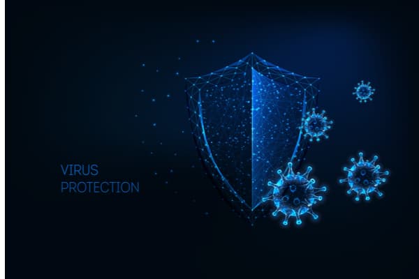 Futuristic virus protection concept with glowing low polygonal shield and virus cells on dark blue background. Antibiotic, vaccination against coronavirus. Modern wireframe design vector illustration.